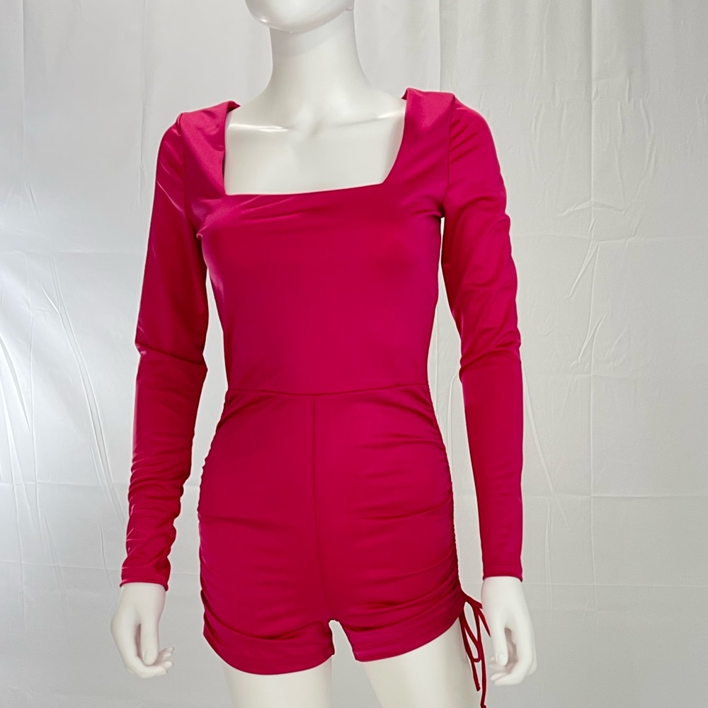 Forever 21 Hot Pink Jumpsuit. Ruched on both sides with adjustable strings.